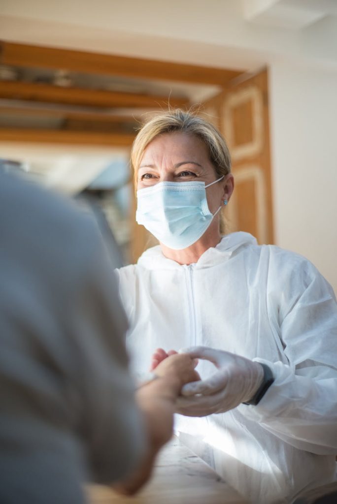 woman wearing face mask and gloves